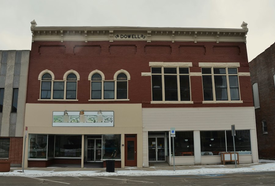 Brick storefronts along a small-town street