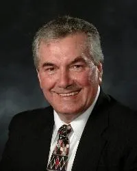 Portrait of Odis Slone Jr., founder of Odis Slone Realty